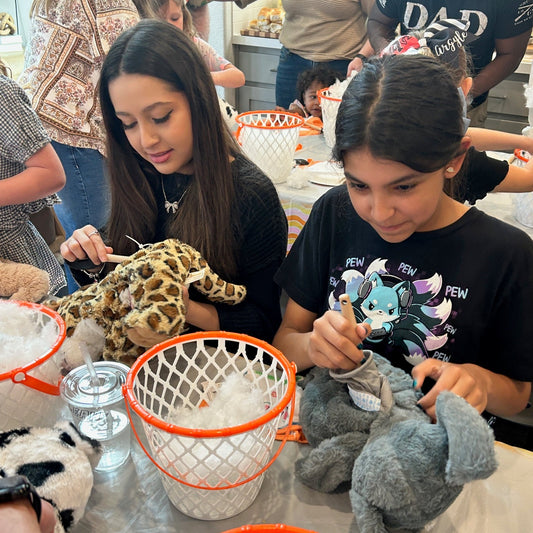 Kids stuffing their own buddy