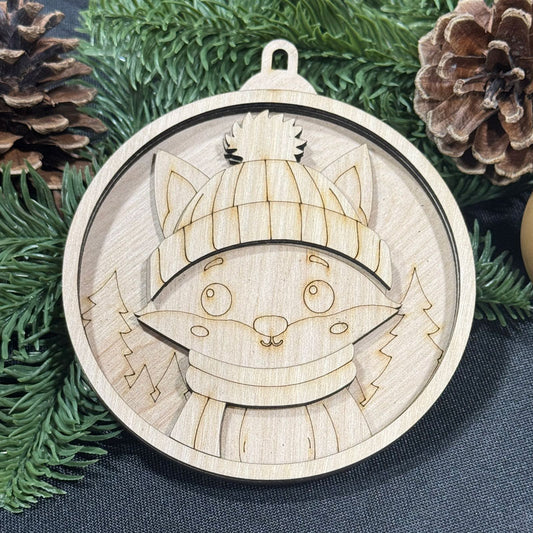 Wooden ornament with fox design on a Christmas tree background